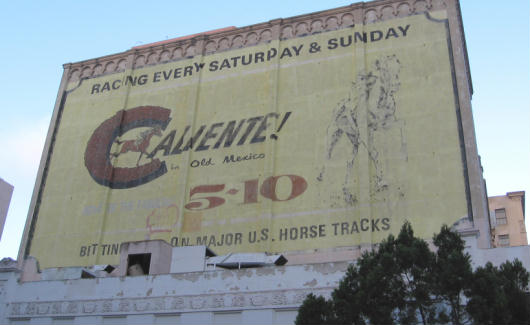 caliente racing ad on san diego building
