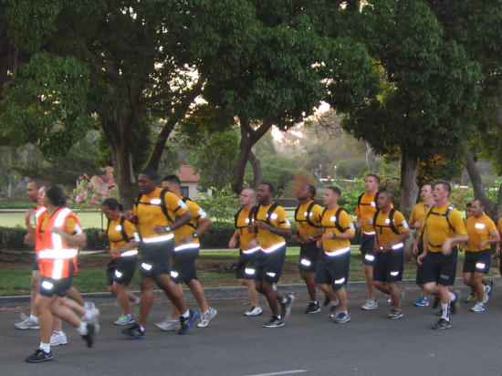 military recruits jog through Balboa Park