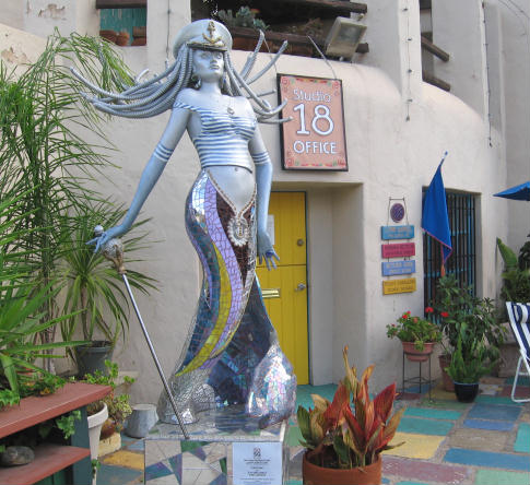 sexy silver mermaid in spanish village
