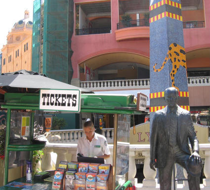 horton plaza statue beside ticket lady