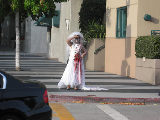 a bride zombie approaches the city park