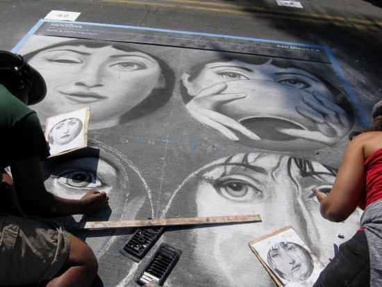 chalk faces at little italy's festa celebration
