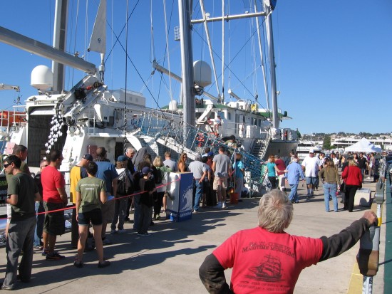 visitors board the greenpeace rainbow warrior ship