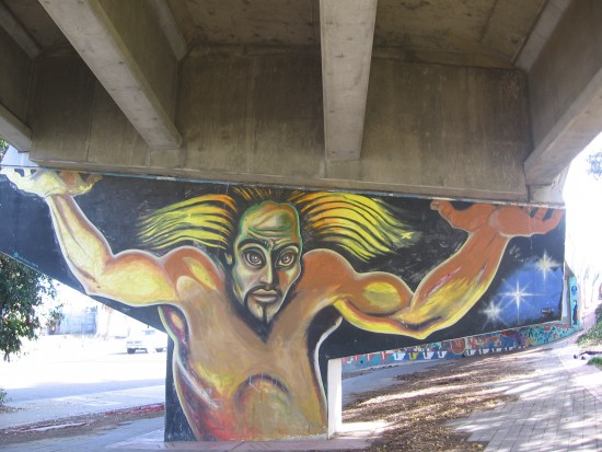 18 Wild-haired figure holds up freeway with huge hands!