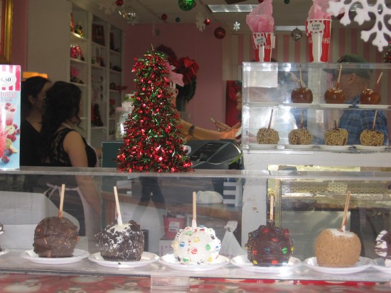 Candied apples in window of the Seaport Village fudge store.