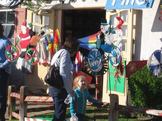 Child takes delight at the Kite Flite shop in Seaport Village.