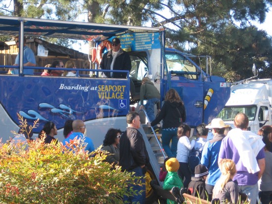 Folks board the Seal Tour amphibious vehicle for a harbor adventure.
