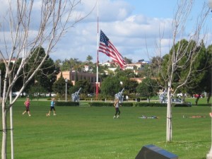 Huge Liberty Station flag at half mast.