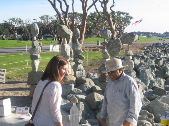 Lady finally succeeds at balancing a rock!