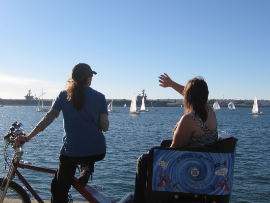 Someone is getting a great tour on a pedicab.