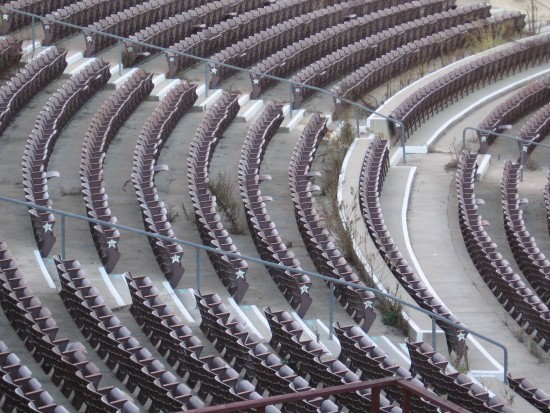 The outdoor Starlight Bowl has an audience of weeds.