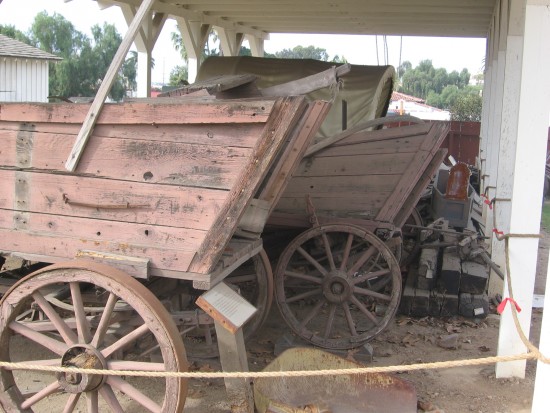 Several unrestored wagons.