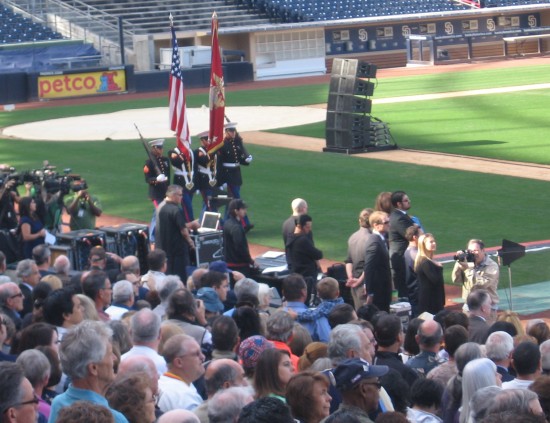 The colors are presented while everyone stands.