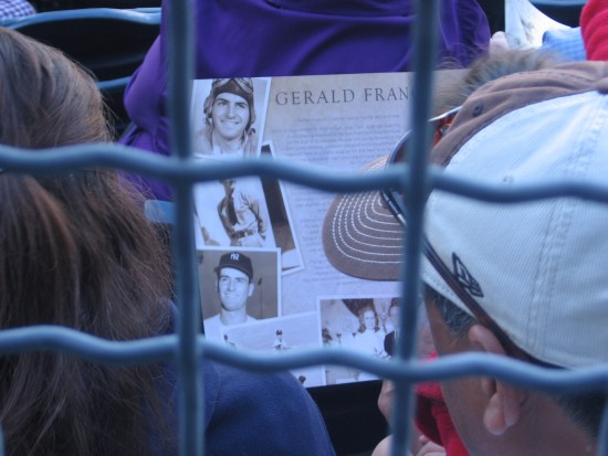 Padres fan reads about a hero's many accomplishments.