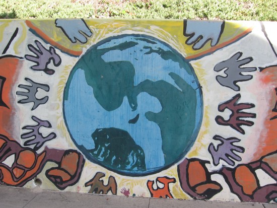 13 Mural behind Chicano Park basketball court.