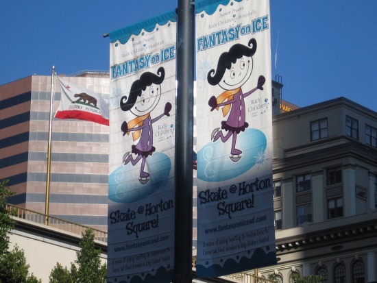 Fantasy on Ice banners hang along Broadway.
