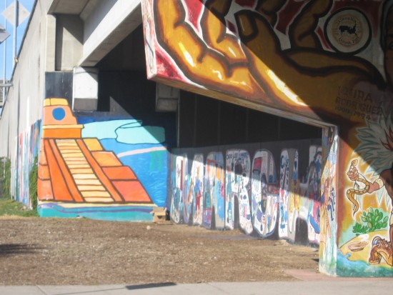 Painted images on Interstate 5 north of Chicano Park.