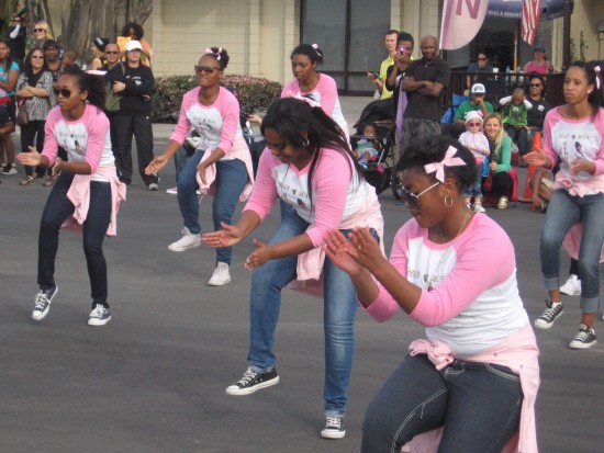A dance routine on Harbor Drive.