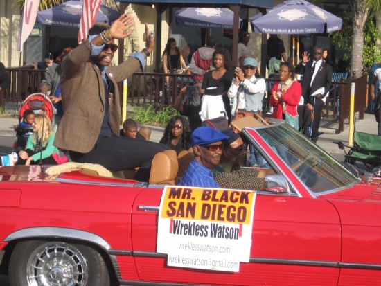 Mr. Black San Diego greets the crowd.