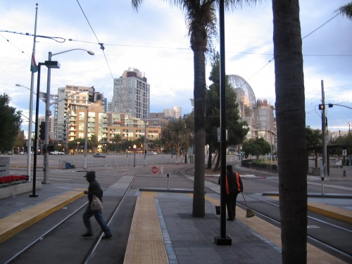 Morning look toward East Village buildings from trolley station.