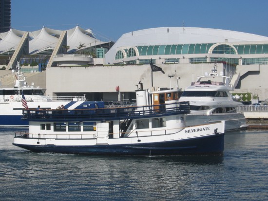 San Diego ferry Silvergate departs behind convention center.