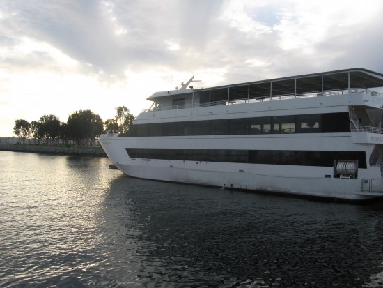 A big yacht seems ready to head toward the light.