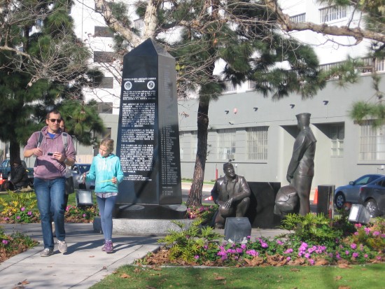 Family walks from the Aircraft Carrier Memorial.