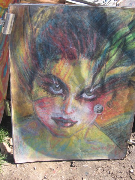 Chalk art contains symbols of yin and yang, and the four elements.