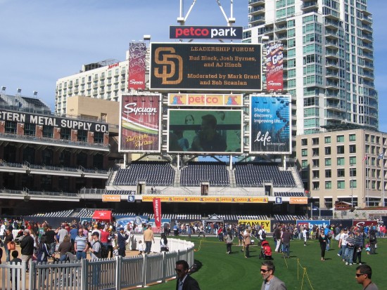 People enjoy themselves on the baseball field at Padres Fanfest.