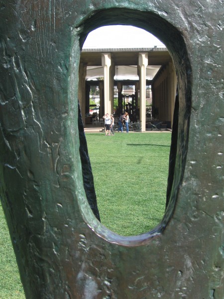 Peeking through one sculpture back across the lawn.