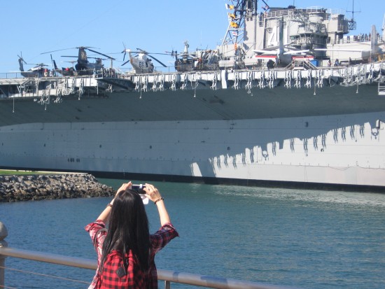 Photo being taken of USS Midway aircraft carrier.