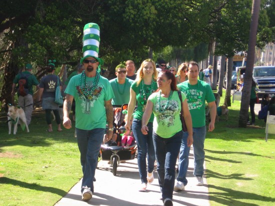 People head up Sixth Avenue to watch the big annual parade.