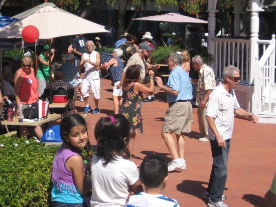 Everyone is jamming to vintage rock and roll music.