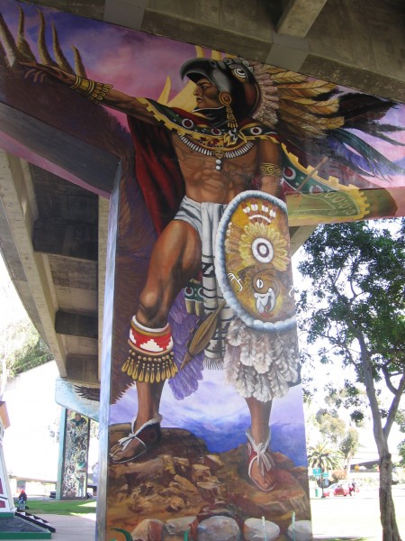 Aztec warrior and shield stand guard in San Diego.