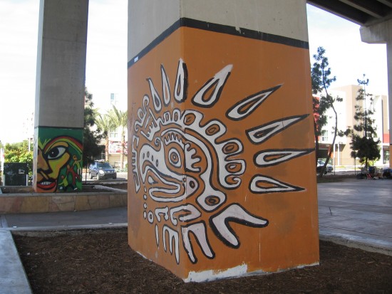 Painted bases of pillars supporting the bridge.