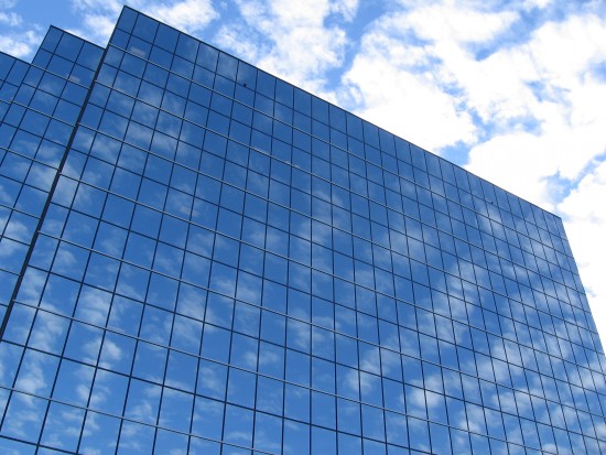 Sky and clouds on a grid of windows.