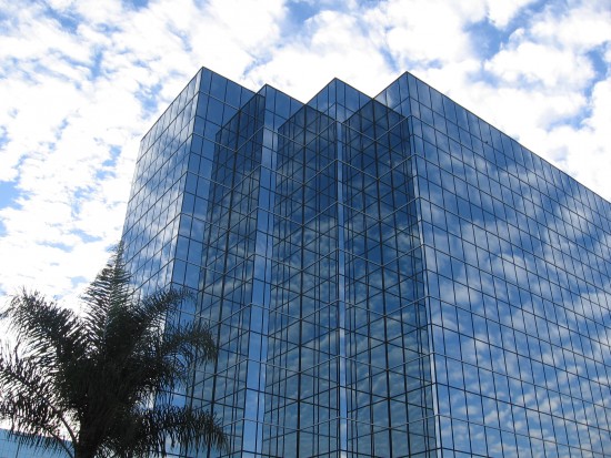 Clouds reflected on several angled planes.