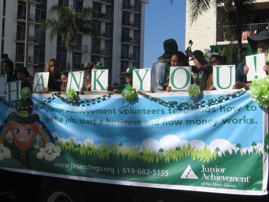 Junior Achievement kids hold THANK YOU spelled out for a photo.