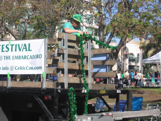 Hanging some Irish green tinsel.
