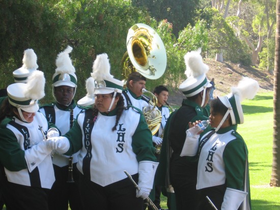 Lincoln High School band members in green.