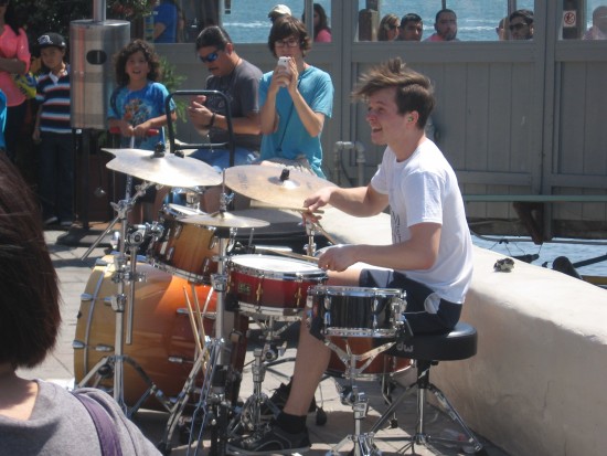 Baard Kolstad drums like crazy near the Pier Cafe.