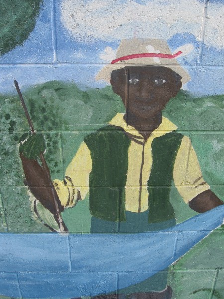 A figure from the extensive Our River mural.