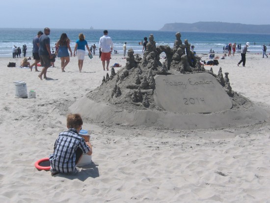 Boy plays on beach near the Hotel del Coronado.