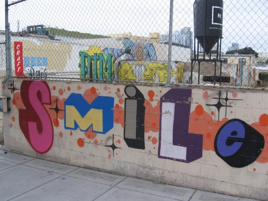 A black silo rises behind a smile!