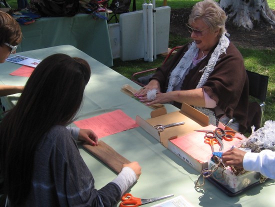 Learning to make yarn from plastic bags.