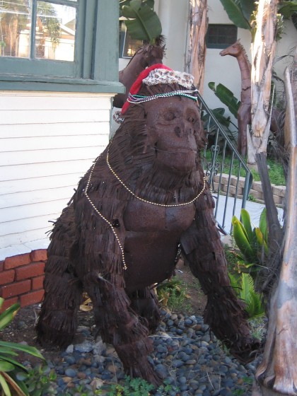 Funny gorilla poses in front of someone's window.