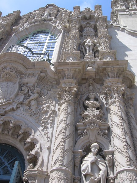Plaster figures from local history adorn the ornate facade.