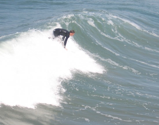 Surfer gets ready to go for a ride.