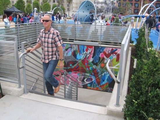 Someone arrives from parking structure beneath new park.