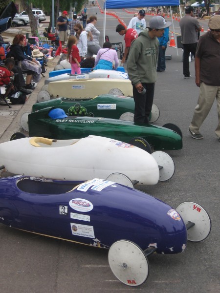 Kids learn workmanship building gravity cars.